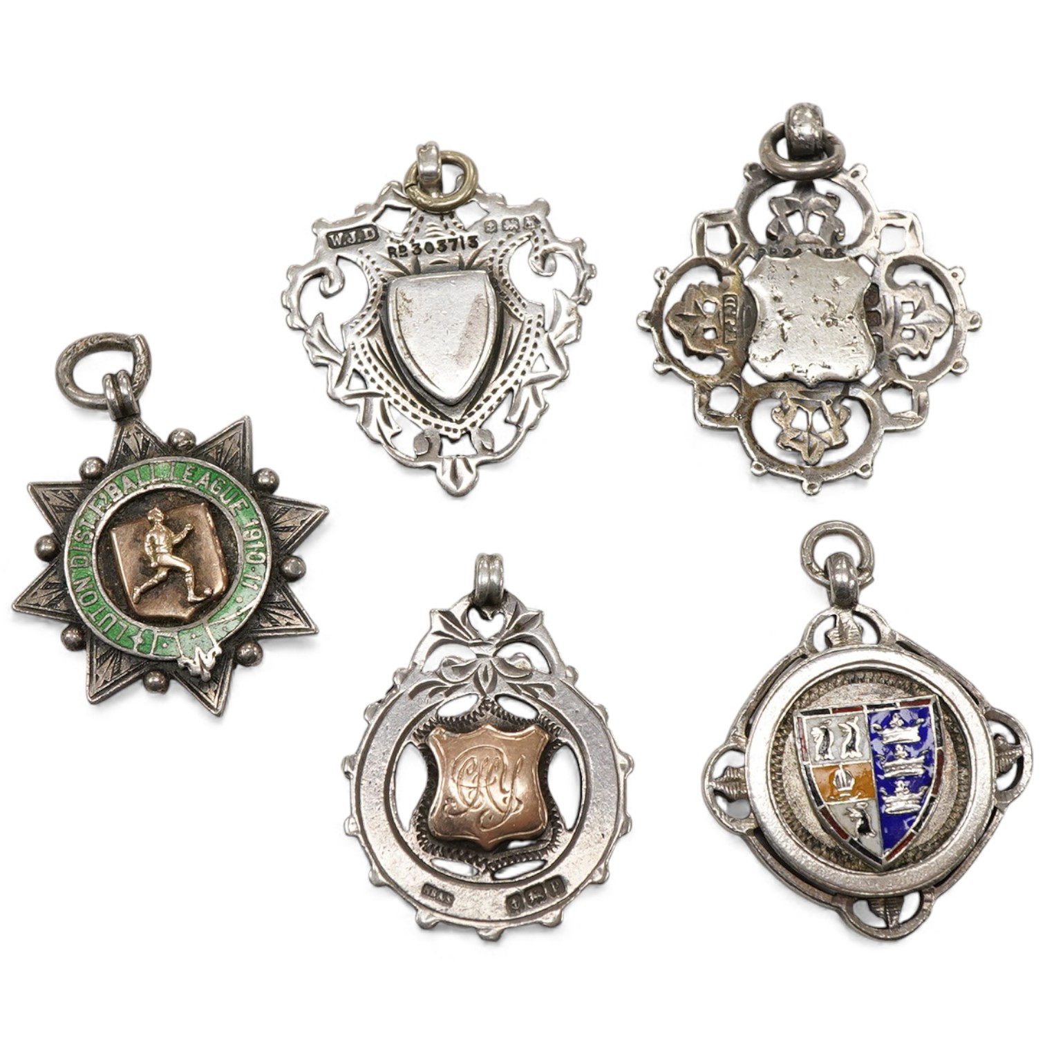 Five assorted early 20th century silver medals, including enamelled 'Luton District Football League, 1910/11', diameter 28mm.